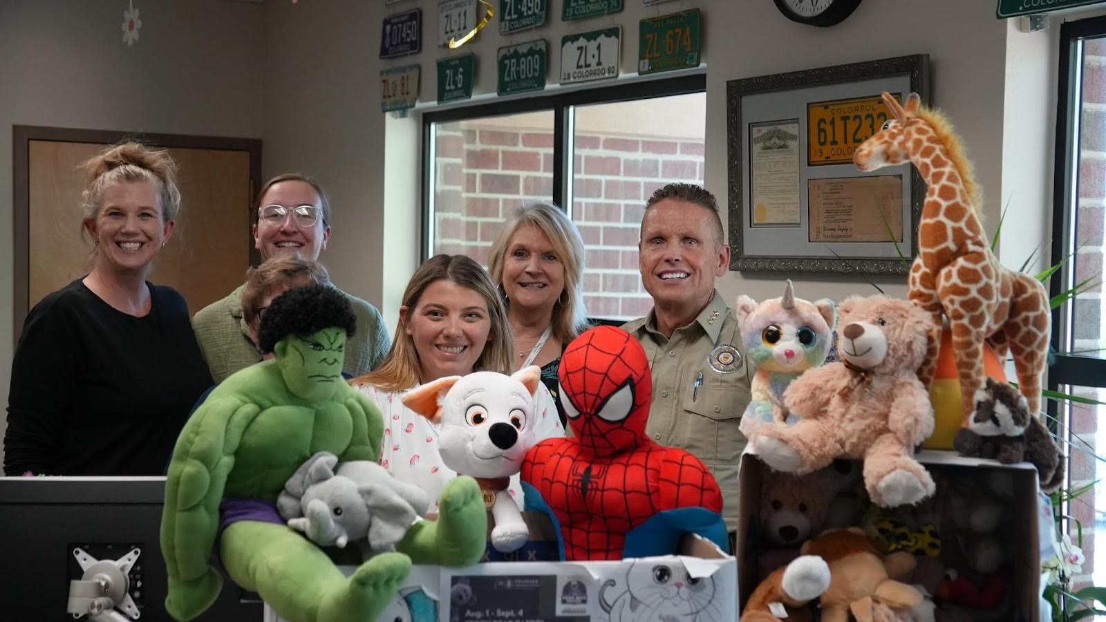 Frisco Driver License Office staff and Sheriff Jamie FitzSimons