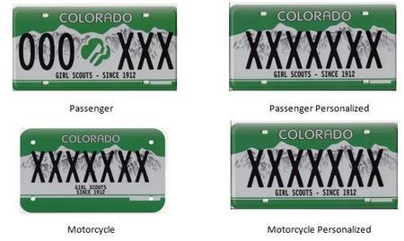 Girl Scouts Colorado License Plate with green background and white mountains featuring the Girl Scouts logo in middle